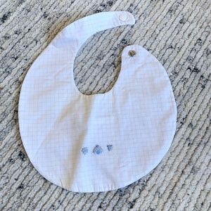 Dior baby round bib with bee design